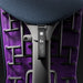 Vista posteriore ravvicinata di una sedia da gioco Nova Herman Miller Embody con tessuto Nightfall Sync blu scuro, telaio nero e schienale viola.