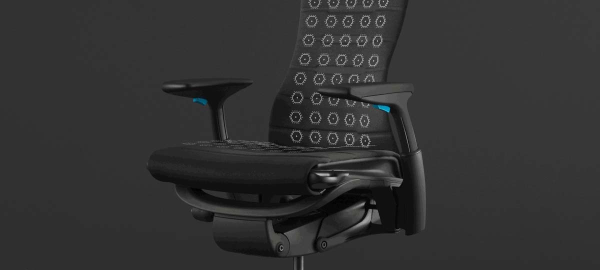 Una animazione che evidenzia l’uniforme distribuzione della pressione della seduta per gaming Embody, sovrapposta a una foto della seduta su uno sfondo nero.